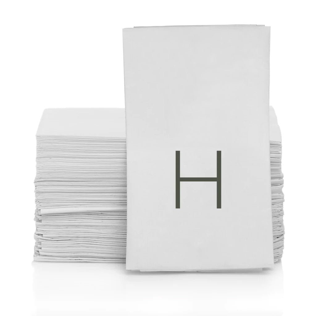 Stack of white 3-ply paper hand towels with a grey monogram letter H.