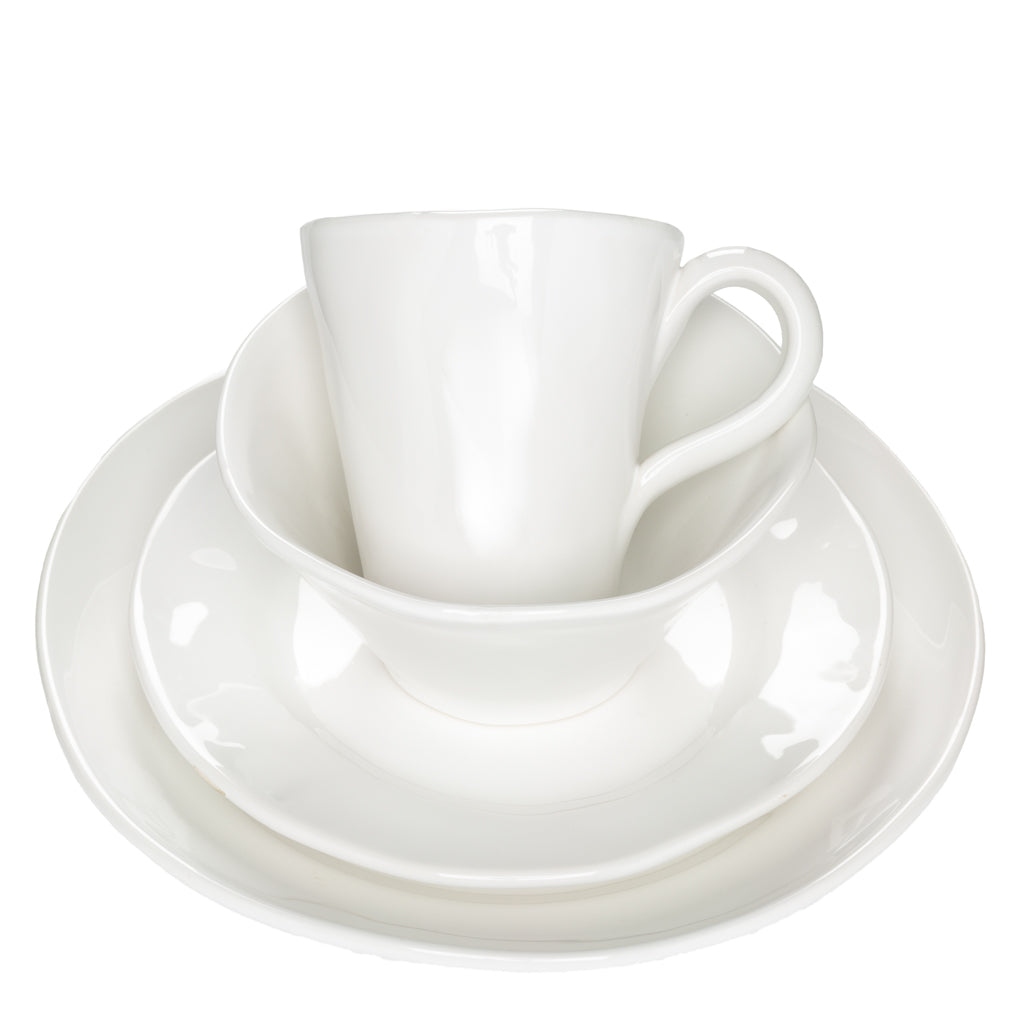 HG Organic Collection creamy white ceramic low bowl, plate, and mug stack.