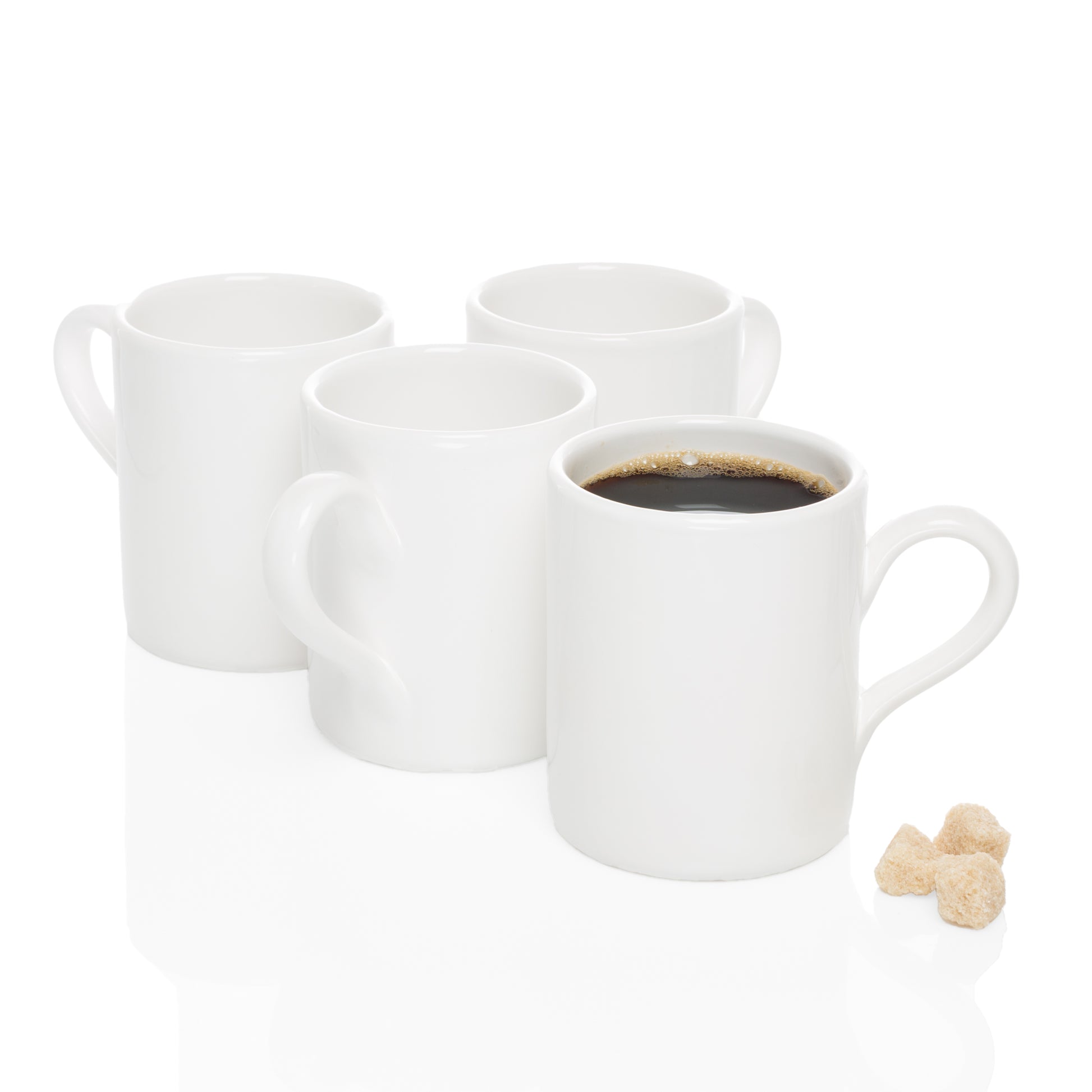 Four white ceramic HG Original Mugs, one filled with coffee, with three brown sugar cubes.