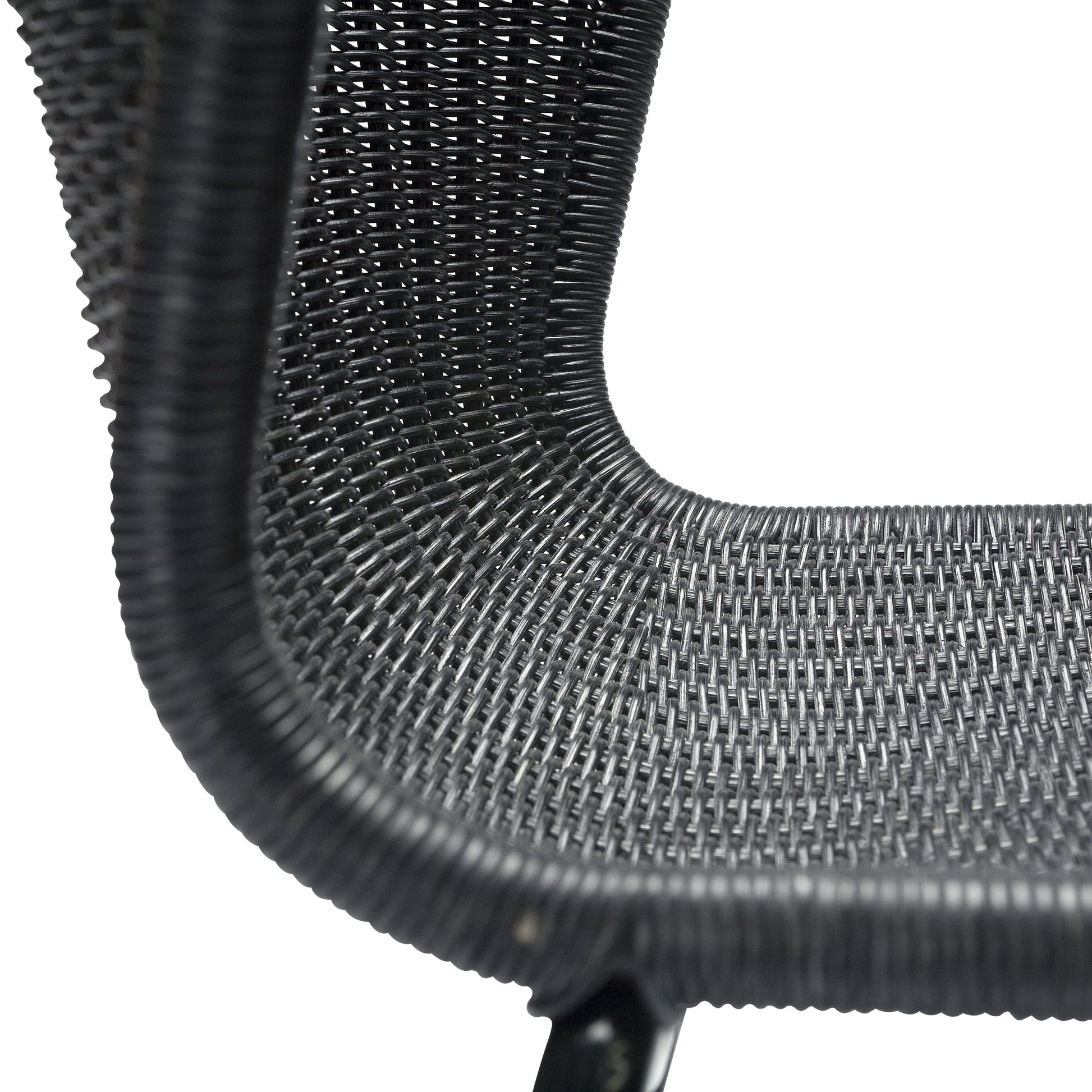 Close-up of a black rattan "Wing" outdoor dining chair with a woven polyethylene wicker seat and steel frame.