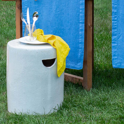 Rustic white ceramic cylinder garden stool with a unique handle cutout, 16.25"Dia x 20"H.