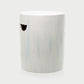 Rustic white ceramic cylinder garden stool with subtle blue streaks and a handle cutout.