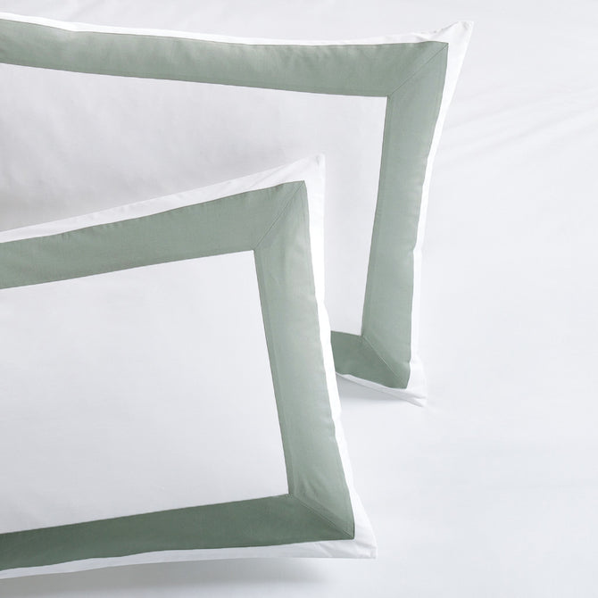 Two Seafoam Green Wide-Band Percale Pillow Shams, white with a 4-inch green border.