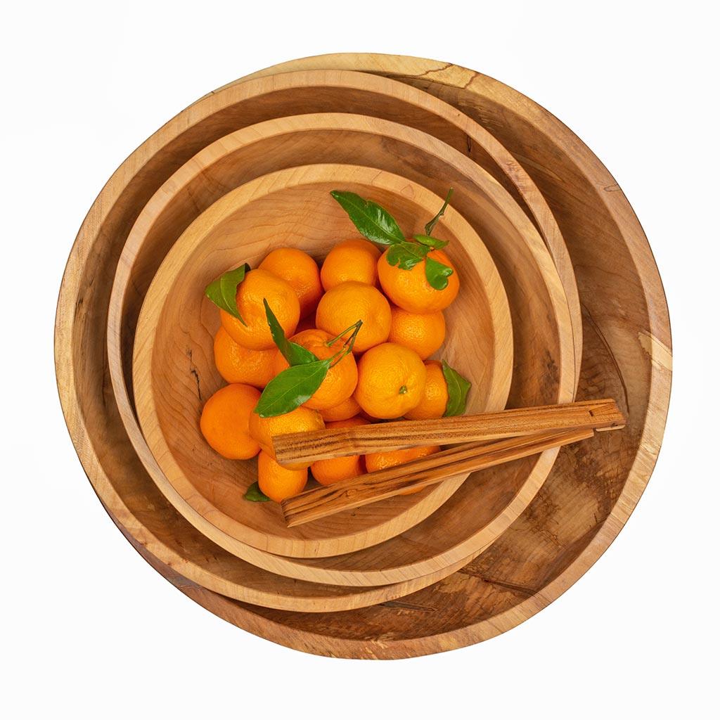 Spalted Maple Wood Bowl, 11", filled with tangerines and wooden tongs, nested in larger wood bowls.
