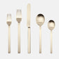 Stile Ice Champagne 5-piece flatware set: 18/10 stainless steel with a mirror-polished champagne finish.