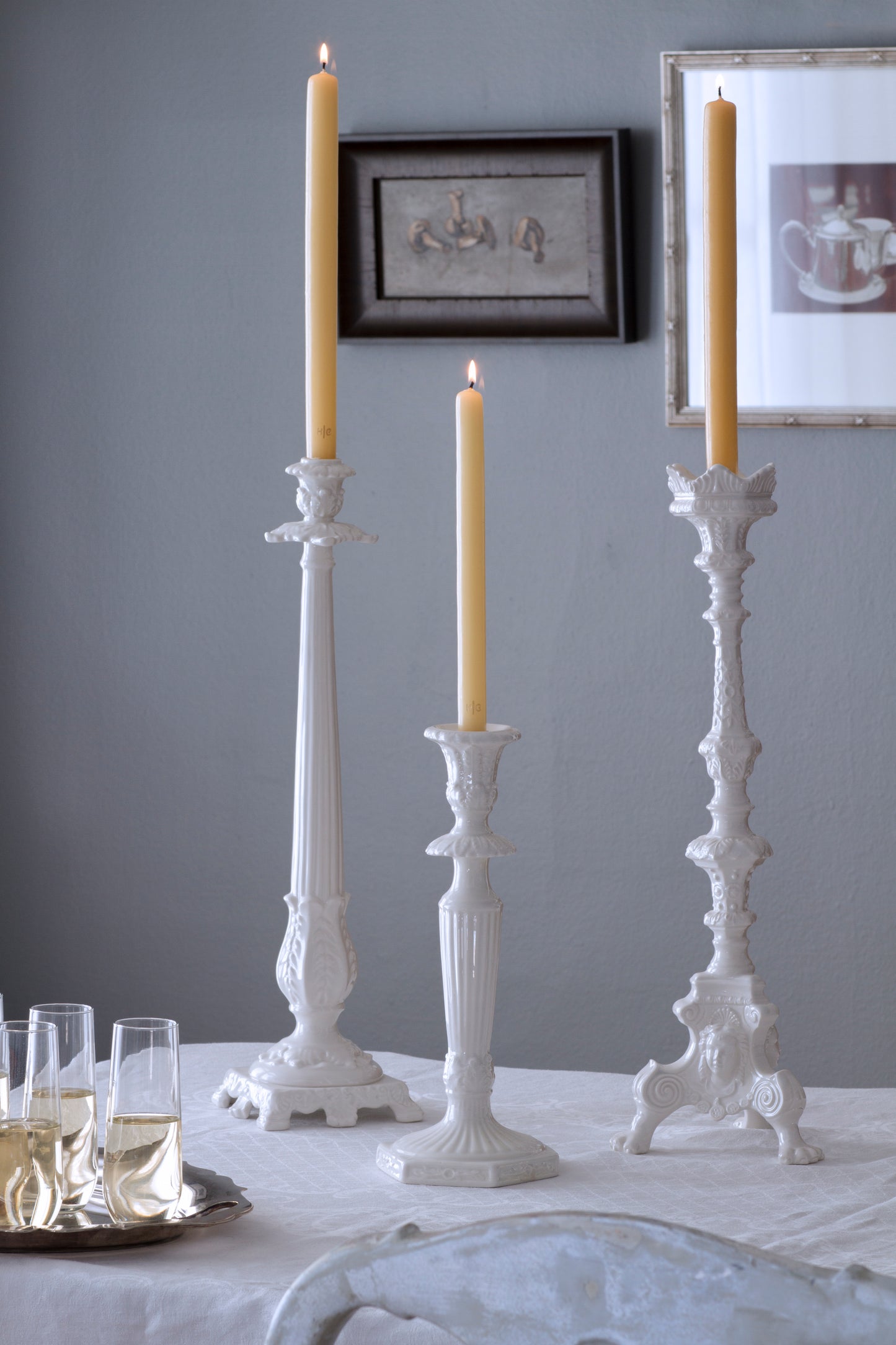white ceramic candlesticks