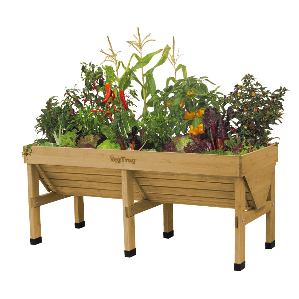 VegTrug Medium V-shaped cedar wood raised planter filled with various vegetables.