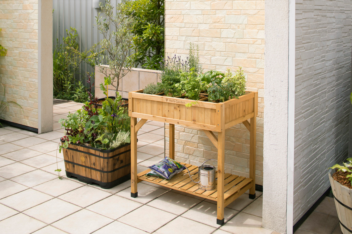 VegTrug Wood Herb Garden Planter, natural cedar, elevated with herbs, storage shelf, and divider.