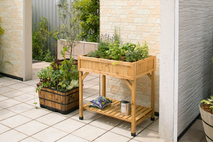 VegTrug Wood Herb Garden Planter, natural cedar, elevated with herbs, storage shelf, and divider.
