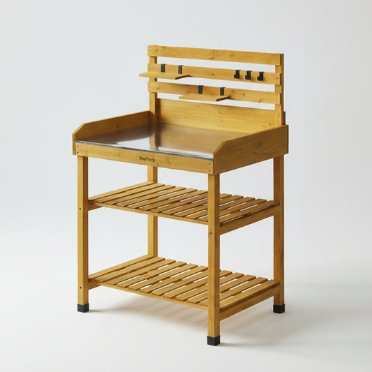 VegTrug Wood Potting Table with metal tray, slatted shelves, and tool hooks.