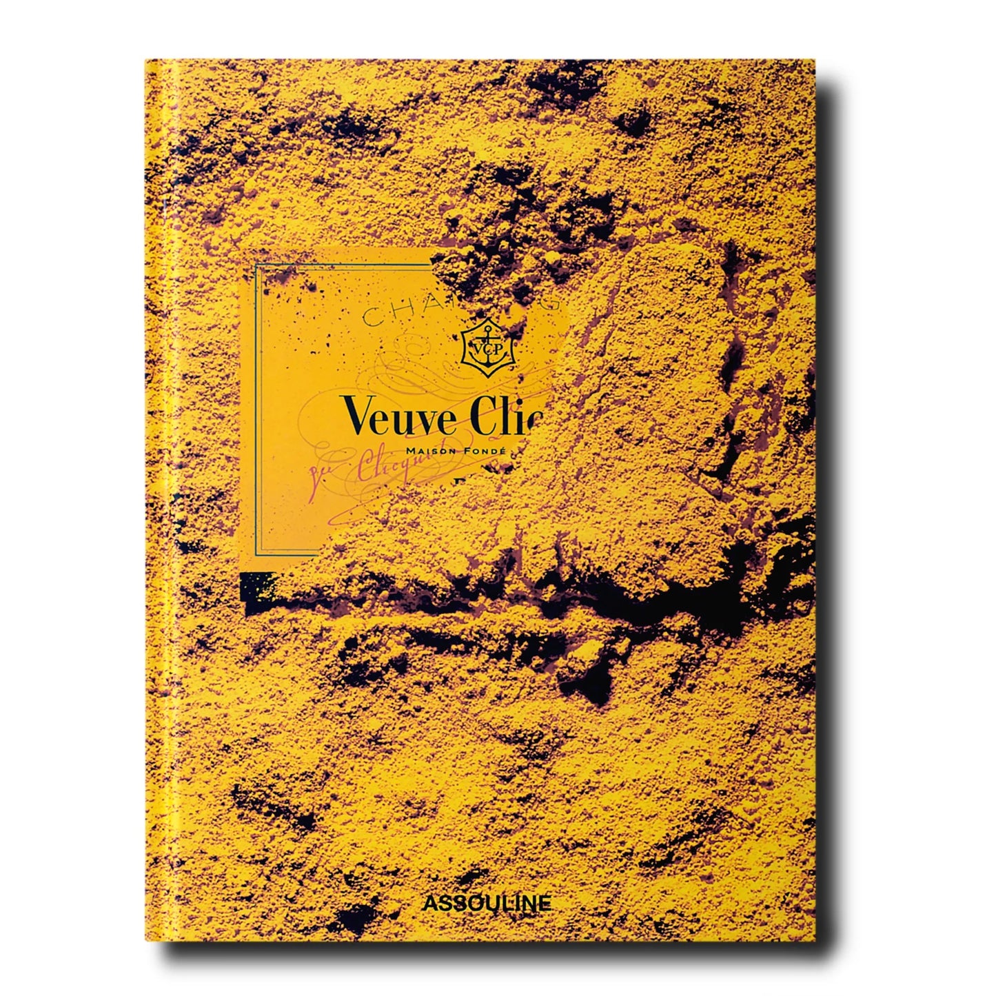 Assouline "Veuve Clicquot" hardback book with a textured yellow cover and black title.