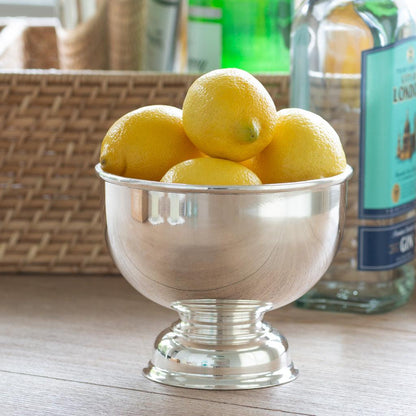 Vintage silverplate 8" footed bowl filled with lemons, c.1960.