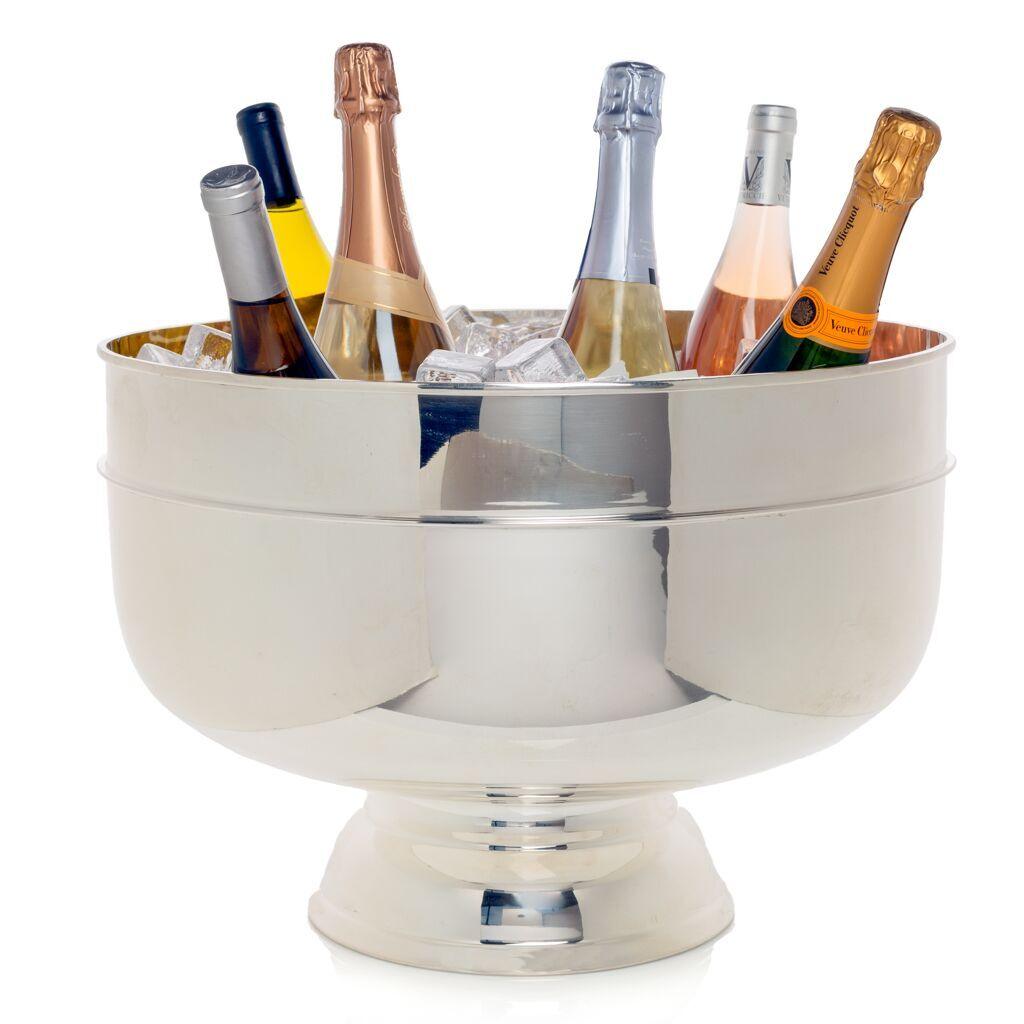 Vintage silverplate footed grand punch bowl, 18", holding champagne bottles on ice.