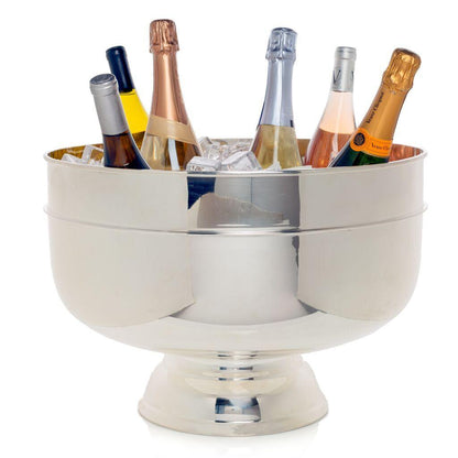 Vintage silverplate footed grand punch bowl, 18", holding champagne bottles on ice.