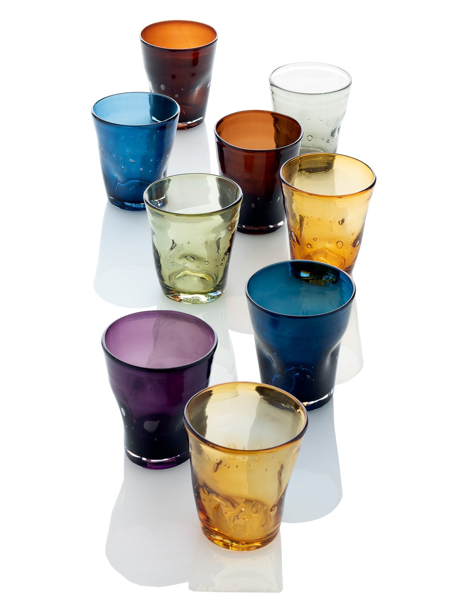 Collection of 9 handmade Henri mouth-blown glasses in various colors: violet, blue, amber, brown, clear, and green.
