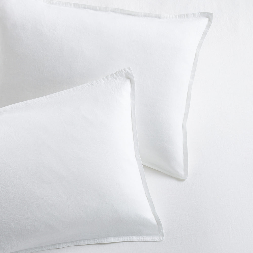 White Washed-Linen Pillow Shams, set of 2, with 2-inch flange and double-needle stitching.