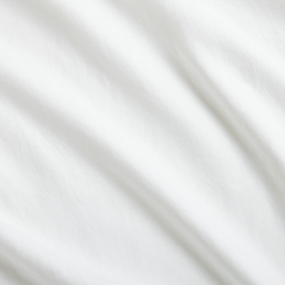 White Washed-Linen Pillowcases, set of 2, with subtle fabric folds and double-needle stitch detailing.