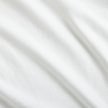 White Washed-Linen Pillowcases, set of 2, with subtle fabric folds and double-needle stitch detailing.