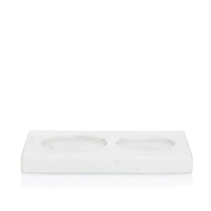 White marble dish soap and lotion tray with two circular indentations.