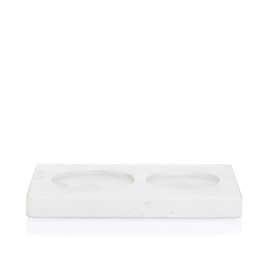 White marble dish soap and lotion tray with two circular indentations.
