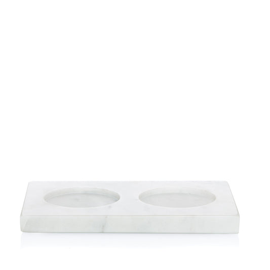 White marble hand soap and lotion tray with two honed circular indentations.