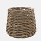 Medium conic woven basket made of natural sandblasted rattan.